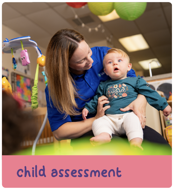 Teacher holding a baby in a classroom with text 'child assessment'